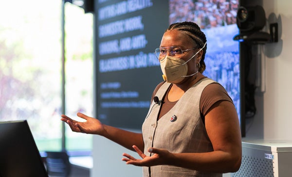 Factulty fellow Jaira J. Harringtonspeaks at event